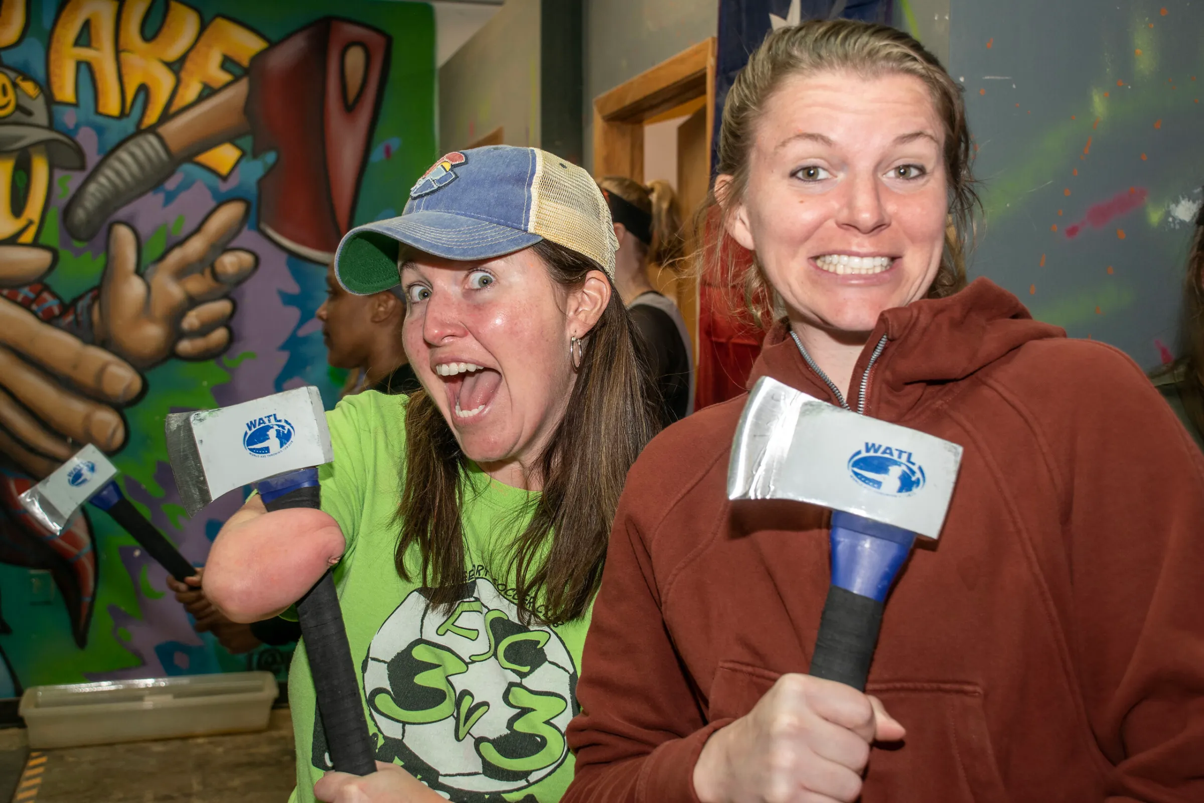 a man and a woman holding a sign