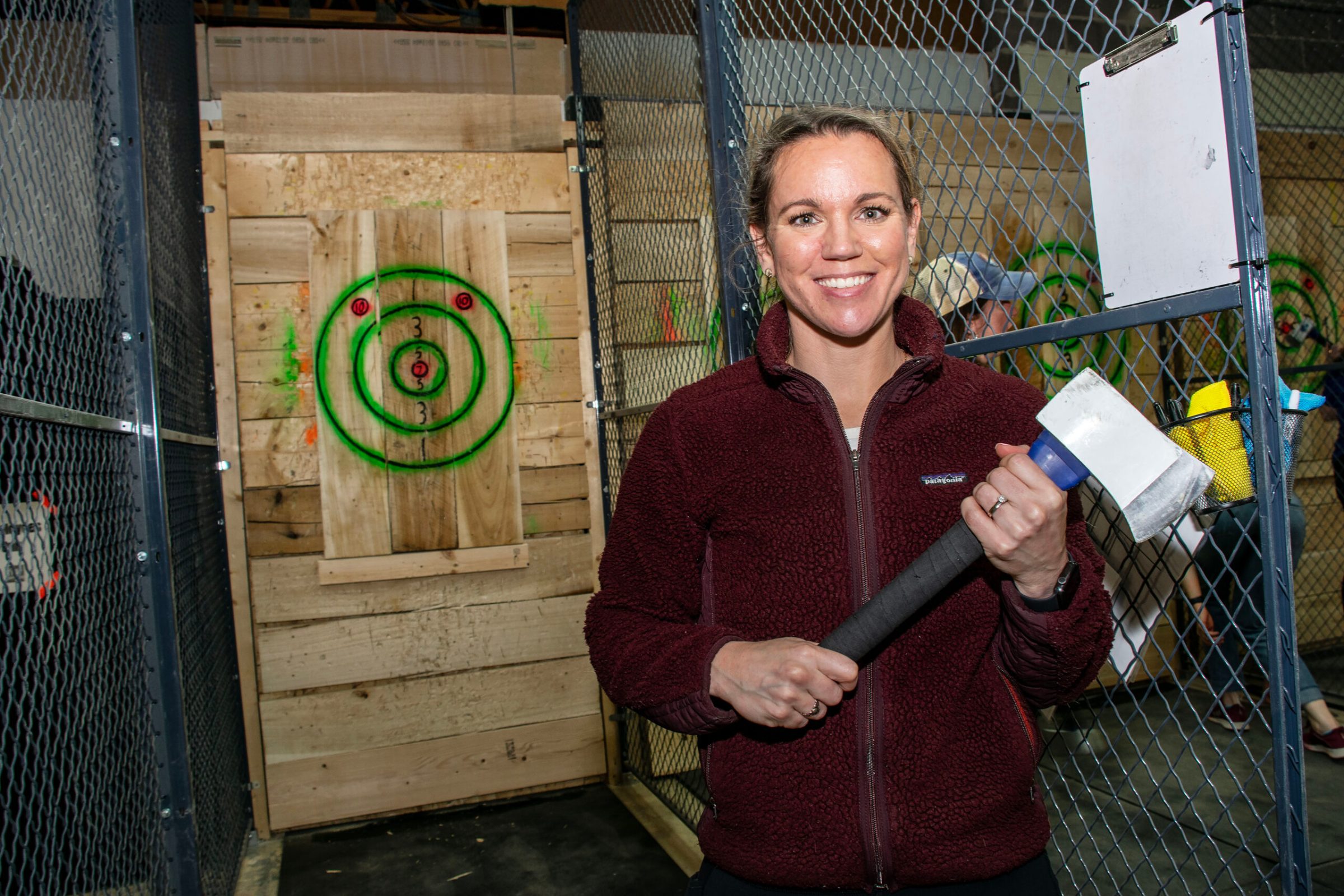 a person standing in front of a fence