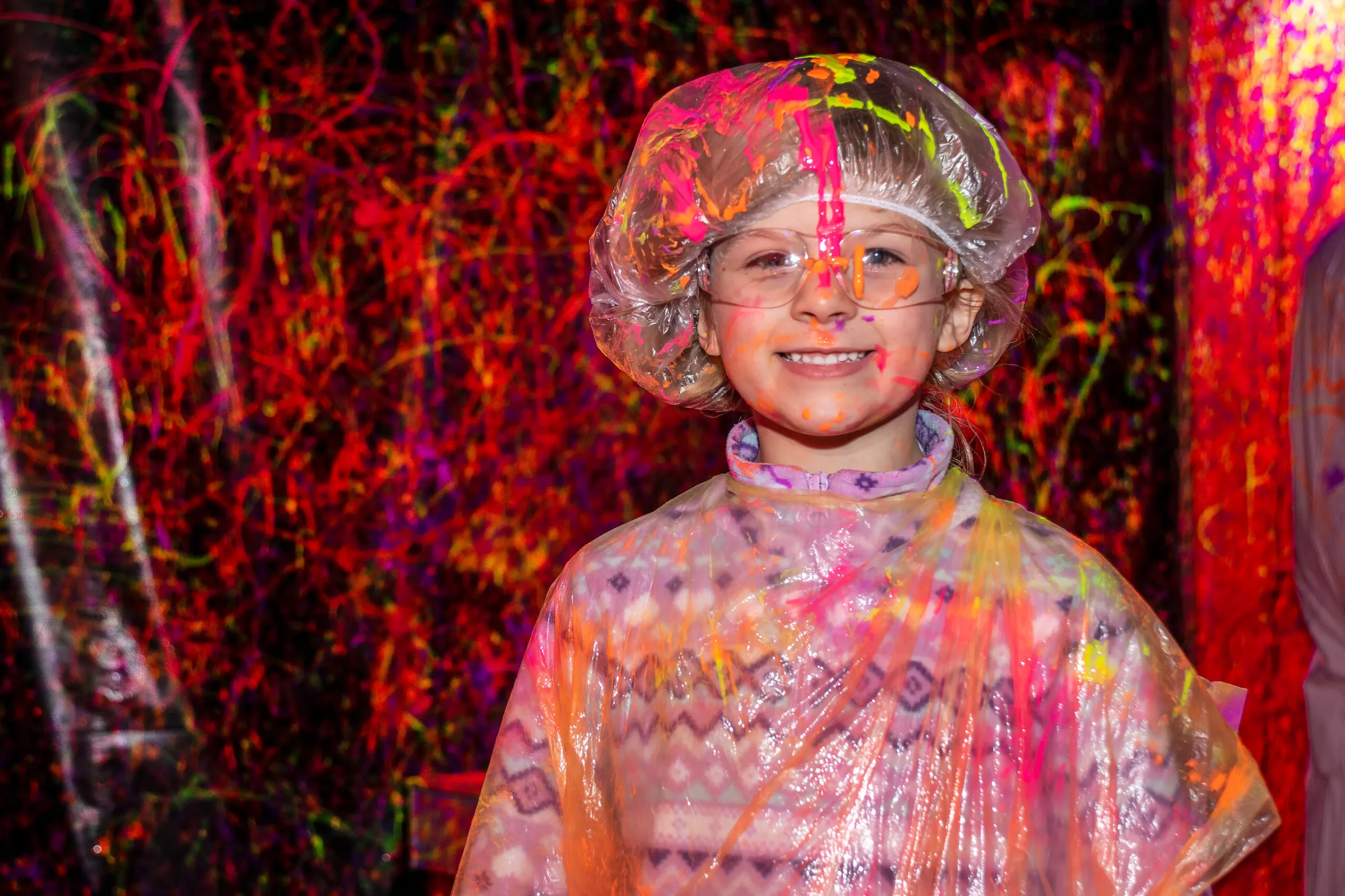 a little girl posing for a picture